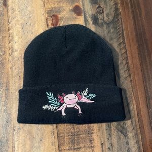 Warm black beanie with axolotl embroidered to front.